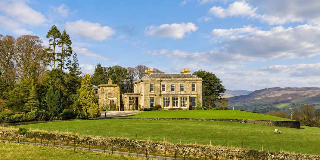 Mortgage for two houses on one title with a corridor connecting properties with 16 acres